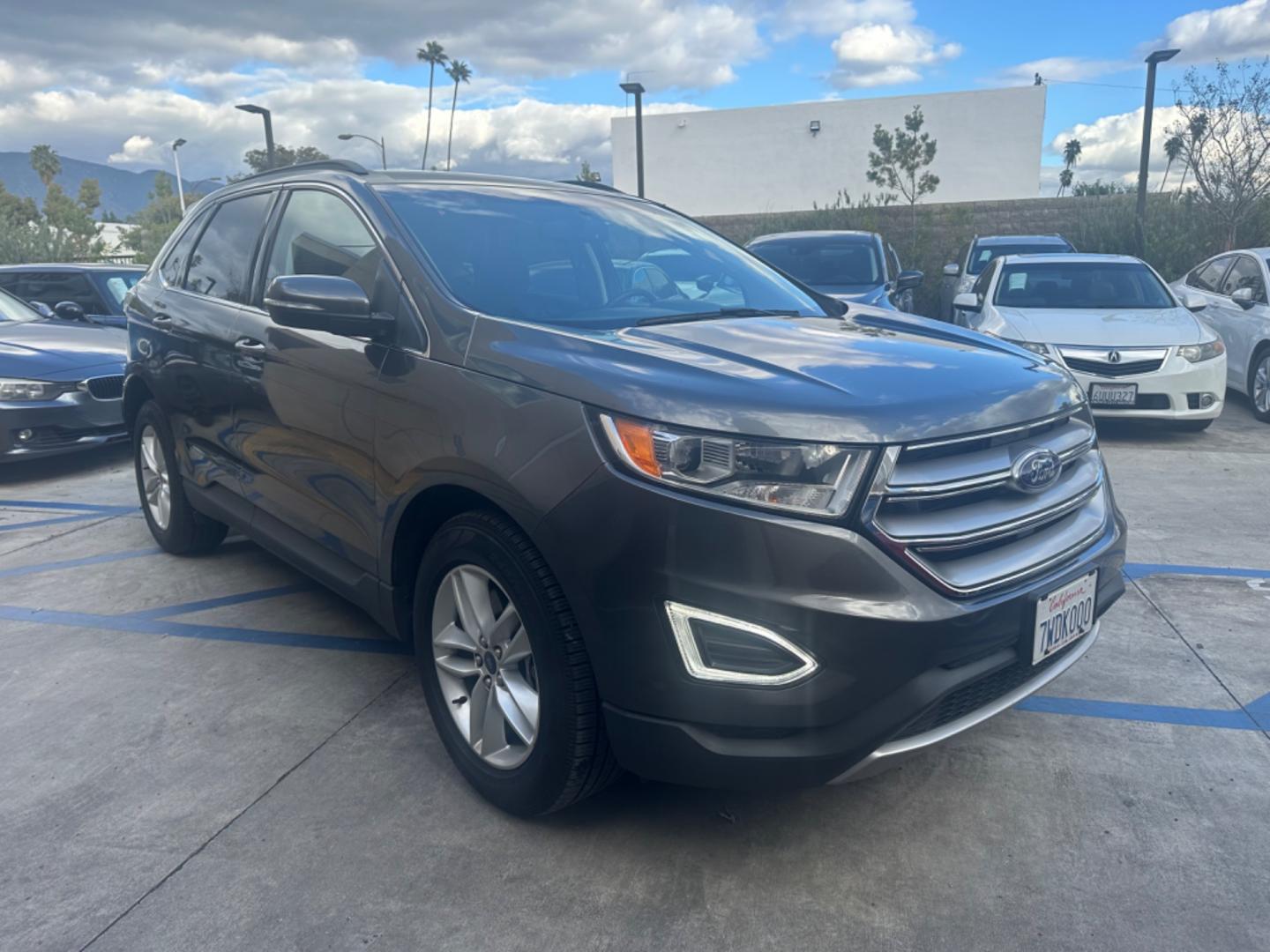 2016 Gray /Black Ford Edge SEL AWD (2FMPK4J93GB) with an 2.0L L4 DOHC 16V engine, 6A transmission, located at 30 S. Berkeley Avenue, Pasadena, CA, 91107, (626) 248-7567, 34.145447, -118.109398 - Photo#6